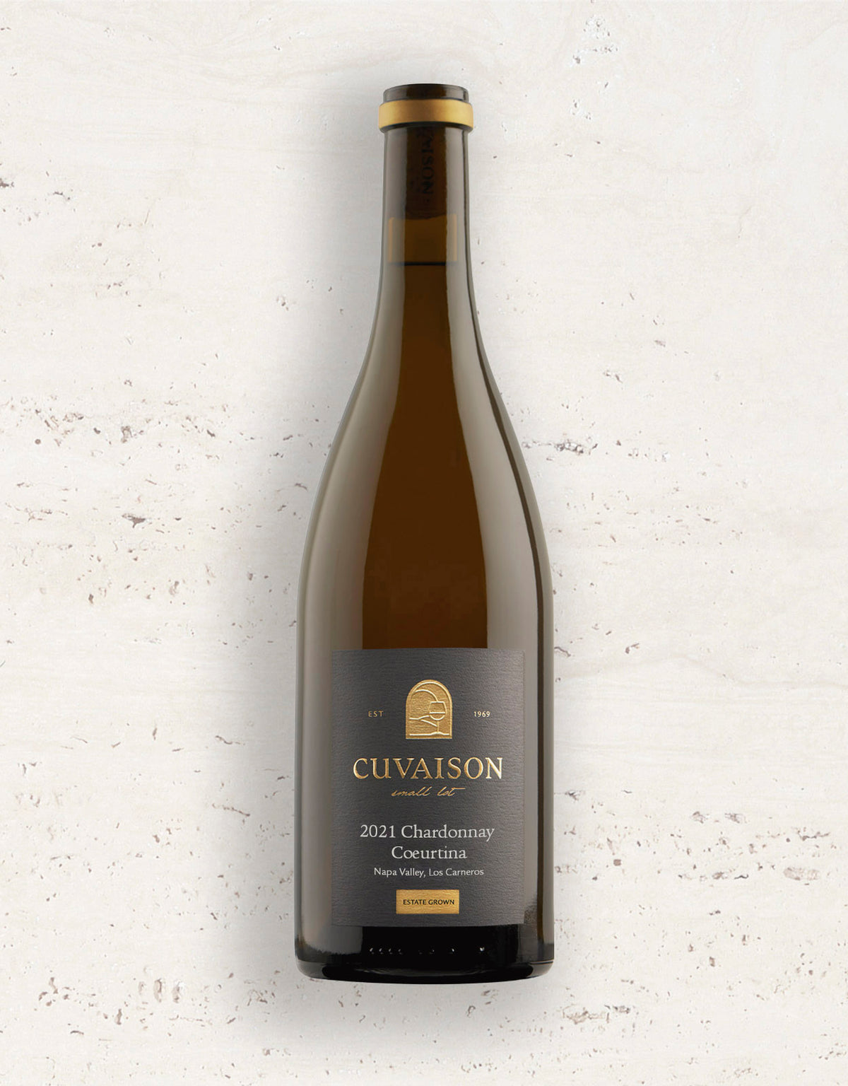 Wine bottle labeled 'Cuvaison' on a textured white background