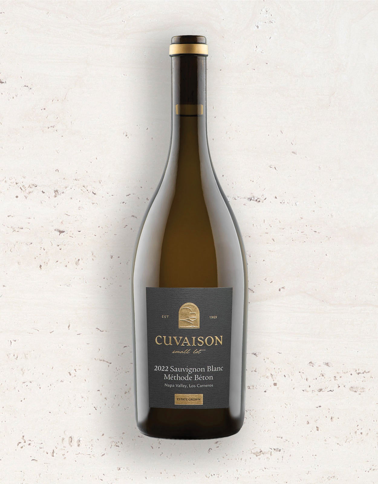Wine bottle with 2022 Cuvaison Sauvignon Blanc, Méthode Béton label on a light gray background