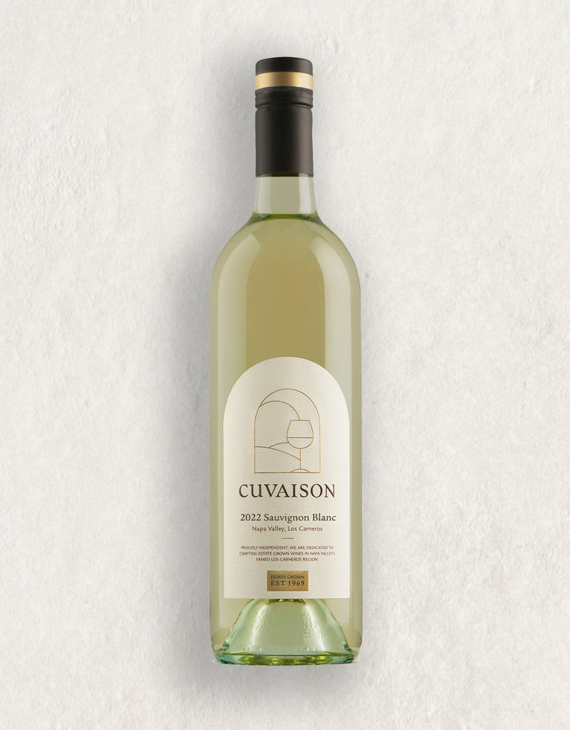 A bottle of 2022 Cuvaison Estate Sauvignon Blanc with a cream label showcasing minimalist line art of a wine glass and details on the variety, vintage, and origin, finished with a black and gold cap.