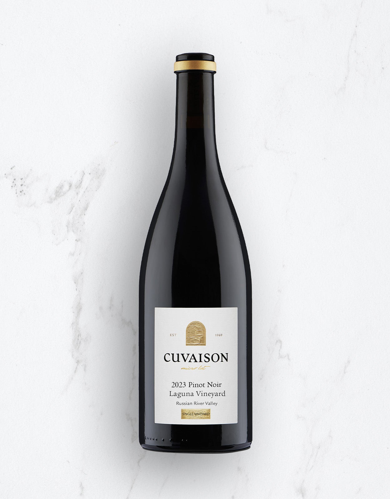 2023 Pinot Noir, Launa Vineyard Wine bottle with 'Cuvaison' label on a marble background