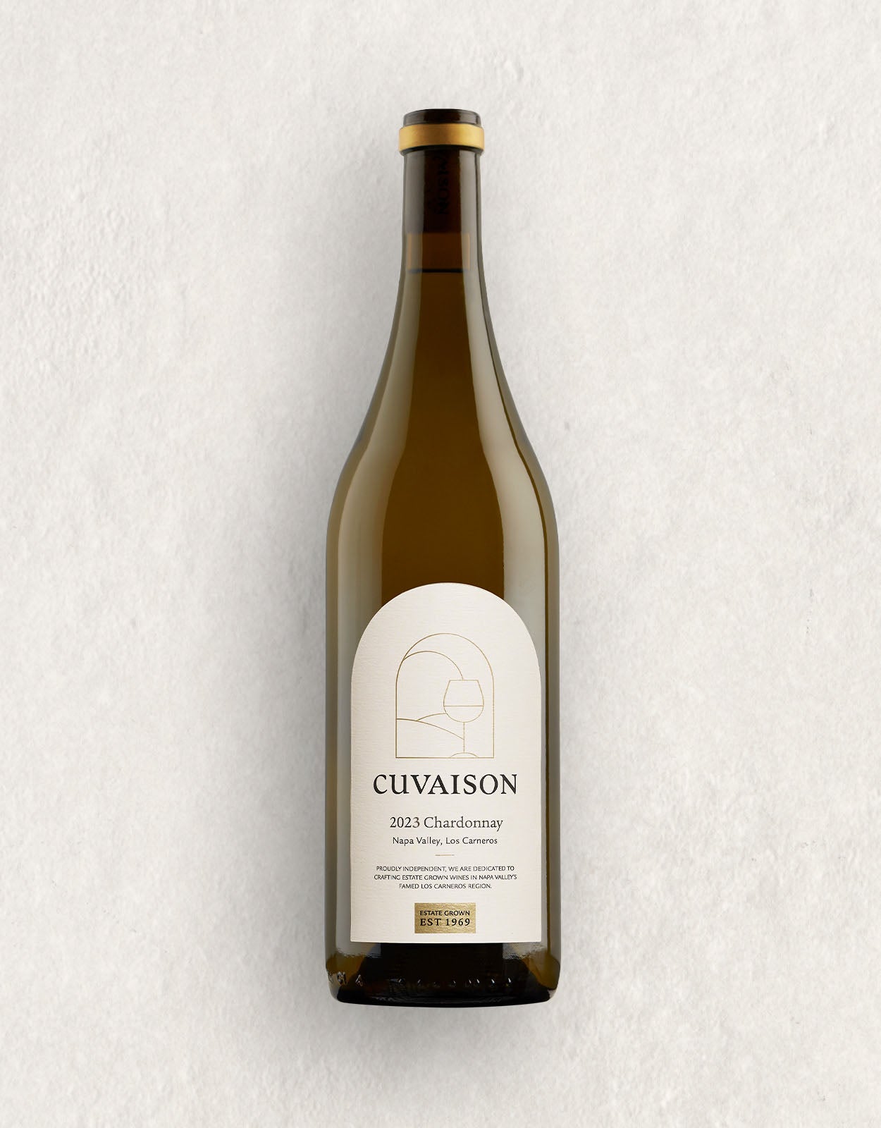 Wine bottle labeled '2023 Cuvaison Chardonnay' on a textured white background