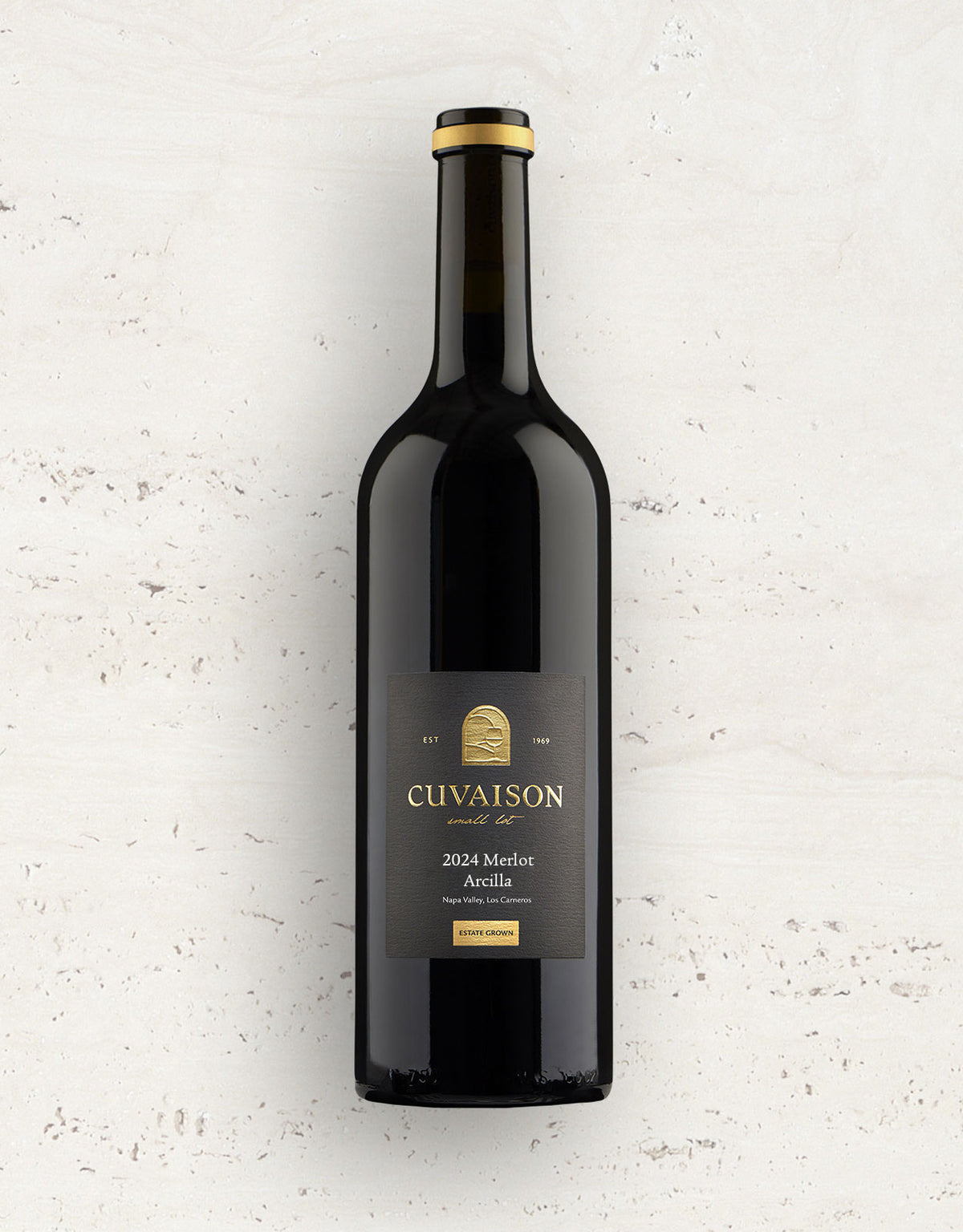 A single bottle of Cuivaison 2024 Mediot Arèllio red wine, featuring a dark glass bottle with a black label and gold accents, set against a textured off-white background.