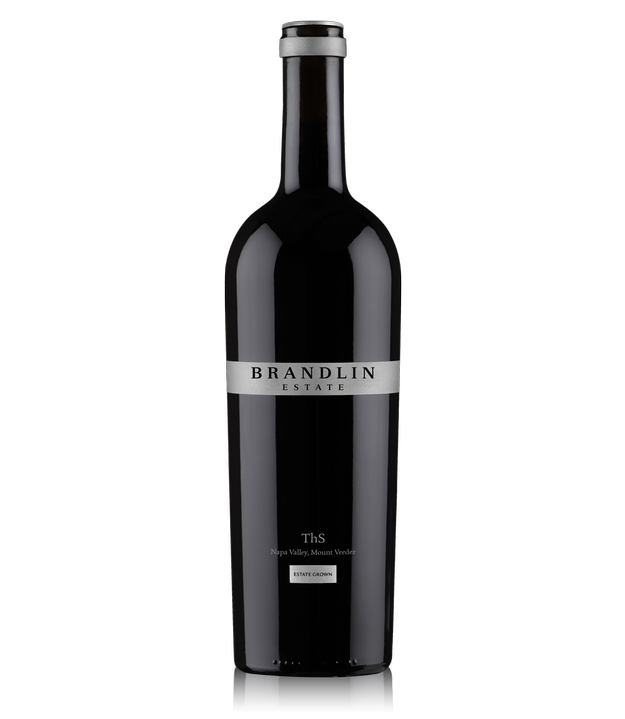 A dark glass bottle of 2019 Brandlin Estate ThS, Cabernet Sauvignon features a silver and black label reading Brandlin Estate, with ThS Napa Valley, Mount Veeder, Estate Grown on a plain light background.