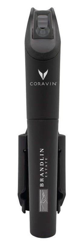 A CORAVIN MODEL Three Brandlin wine preservation system in black, featuring Coravin and Brandlin Estate logos, is displayed upright against a white background.