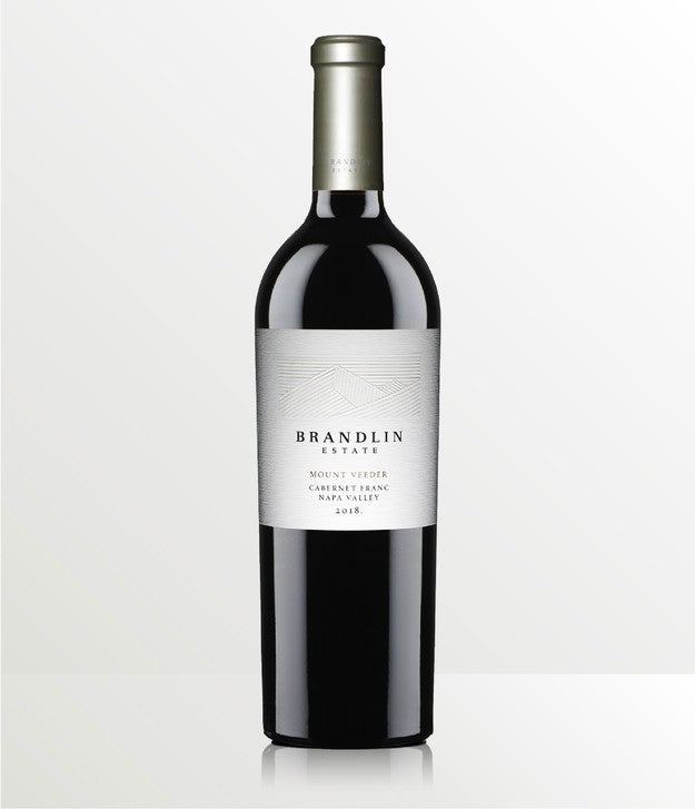 A bottle of 2018 Brandlin Estate Cabernet Franc with a silver foil top and a white label reading Brandlin Estate, Mount Veeder, against a plain light background.