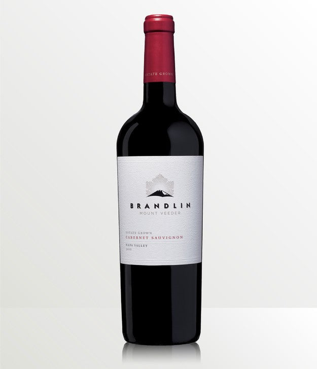 A bottle of 2016 Brandlin Estate Cabernet Sauvignon from Napa Valley, featuring a red foil capsule and a white label with black and red text, set against a minimalistic white background.